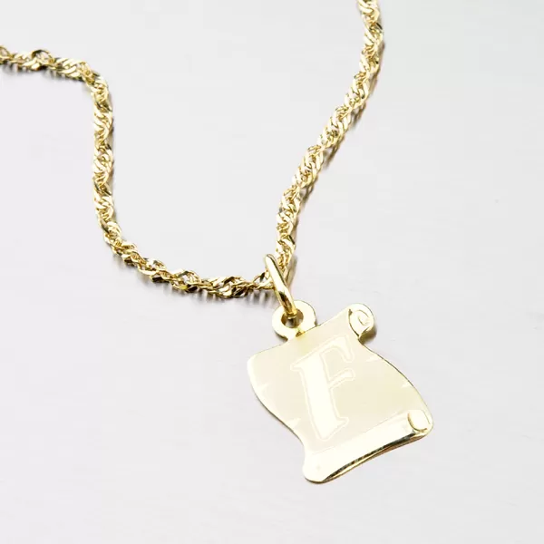 Zlatý pergamen s písmenkem F 43-2065-F