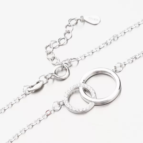 Stříbrný náramek se zirkony BST-14410