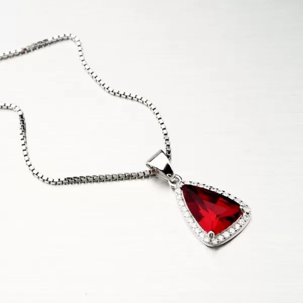 Stříbrný přívěsek s červeným zirkonem PKL-3103