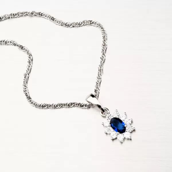 Stříbrný přívěsek s modrým zirkonem PKL-3115