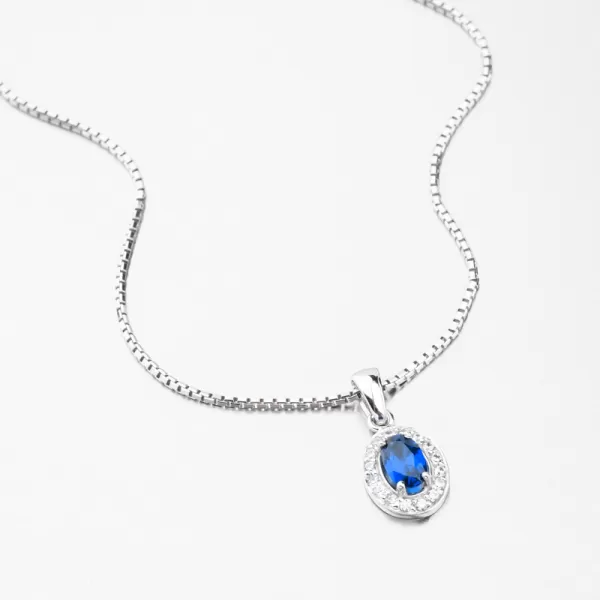 Přívěsek z bílého zlata se safírem a zirkony 53GZ-8056-B-SAF
