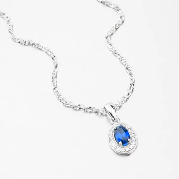 Přívěsek z bílého zlata se safírem a zirkony 53GZ-8056-B-SAF