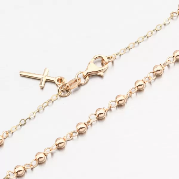 Zlatý kuličkový náramek s křížem 14R-031