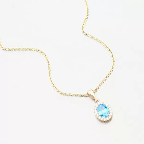 Zlatý přívěsek s modrým topazem a se zirkony 13R-429