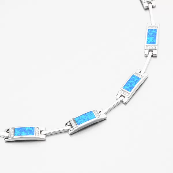 Stříbrný náramek s modrým opálem a se zirkony PKL-4041