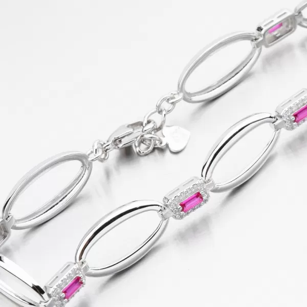 Stříbrný náramek s rubíny a se zirkony PKL-4038