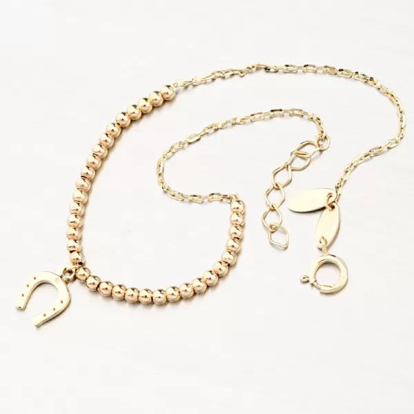 Zlatý náramek s kuličkami a podkovou 144P-141240