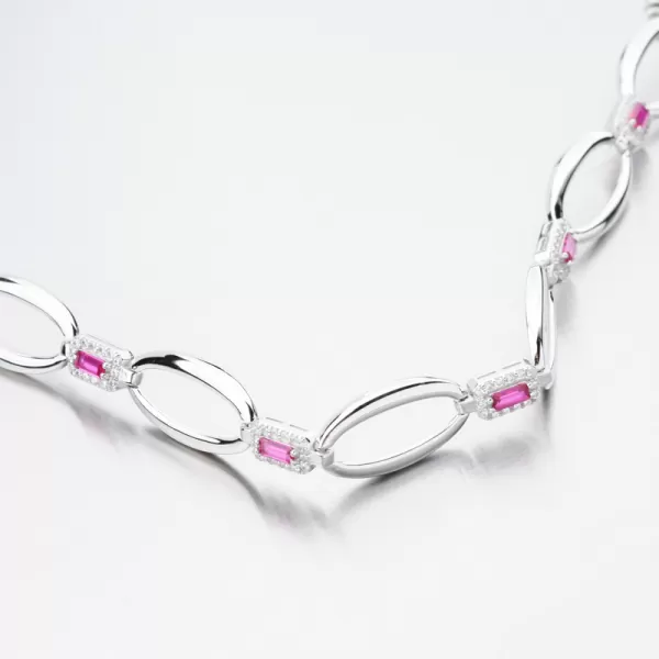 Stříbrný náramek s rubíny a se zirkony PKL-4038